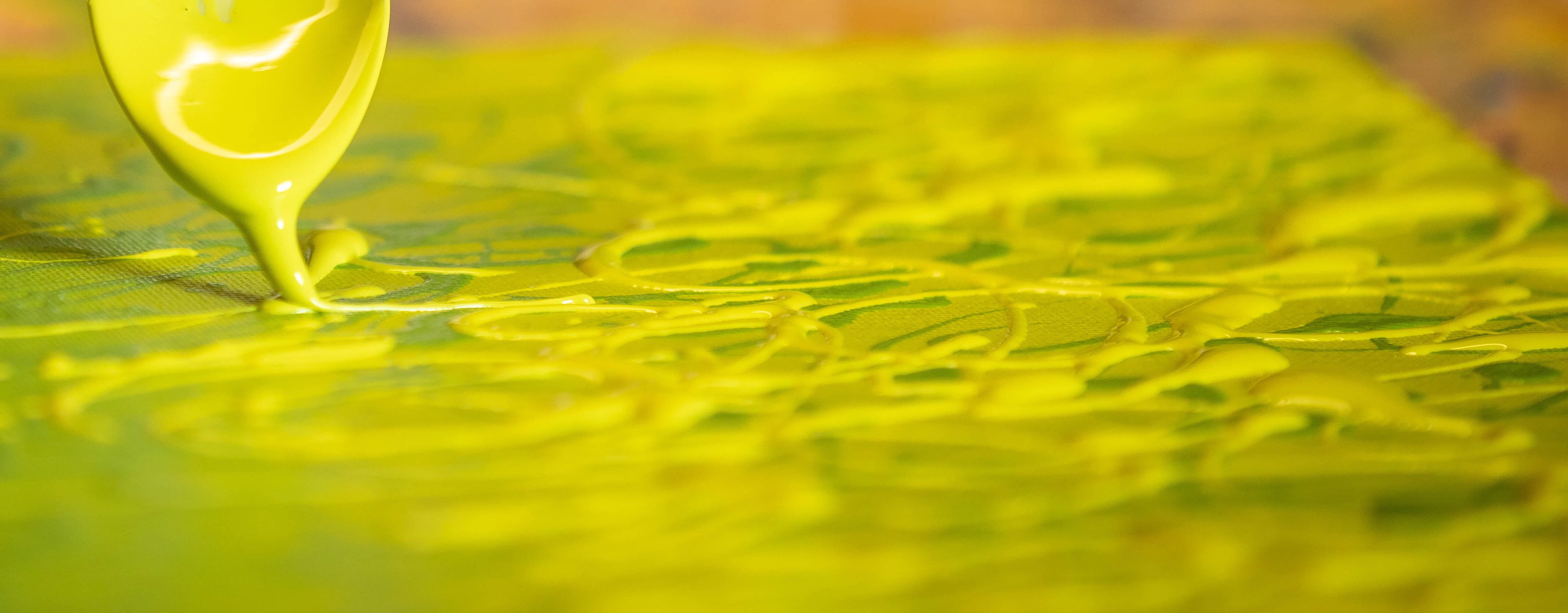 Close-up of a modern abstract canvas using sustainable eco-friendly materials and vibrant lime colours.