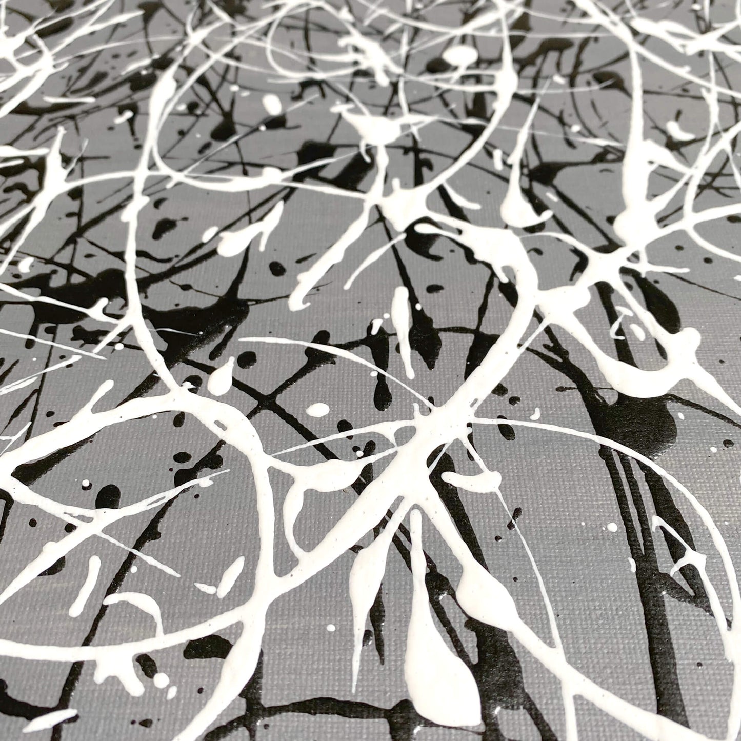 Two original abstract Pollock style drip painting on canvas board.