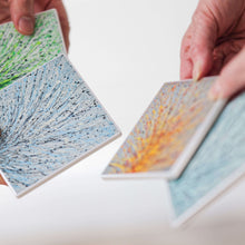 Load image into Gallery viewer, Vortex - Set of four ceramic coasters.
