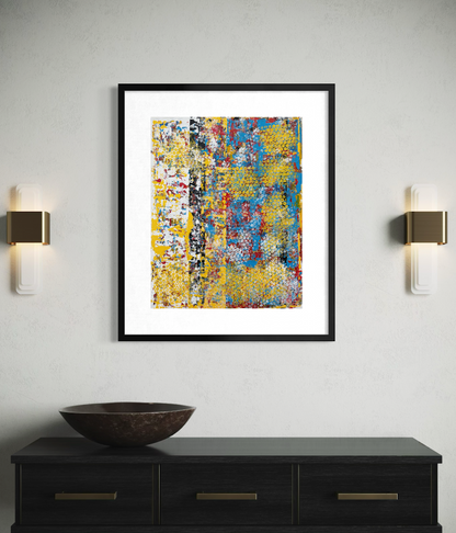 Lifestyle mock-up showing colourful original abstract artwork by Mike Hall in a black frame above a contemporary dark sideboard.