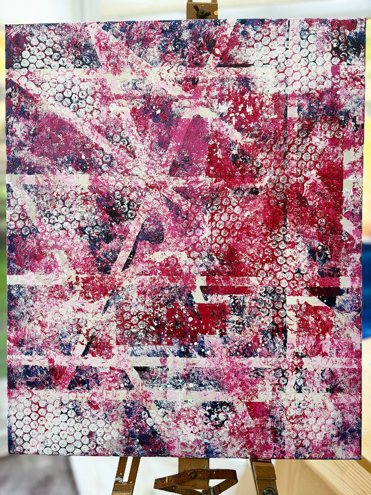 Pop & Circumstance II original abstract painting by Mike Hall, featuring vibrant pink, magenta, red and dark blue layers with expressive textures and repeated circular patterns.
