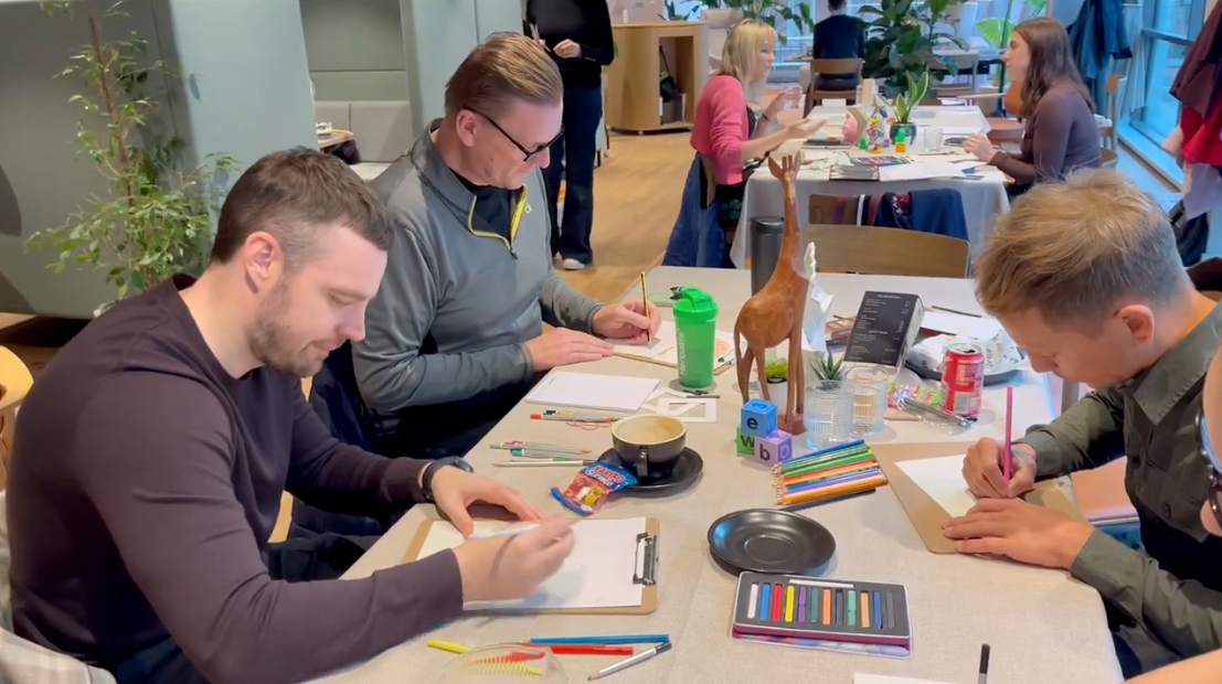 Load video: Short video showing people taking part in a Create &amp; Connect creative networking session