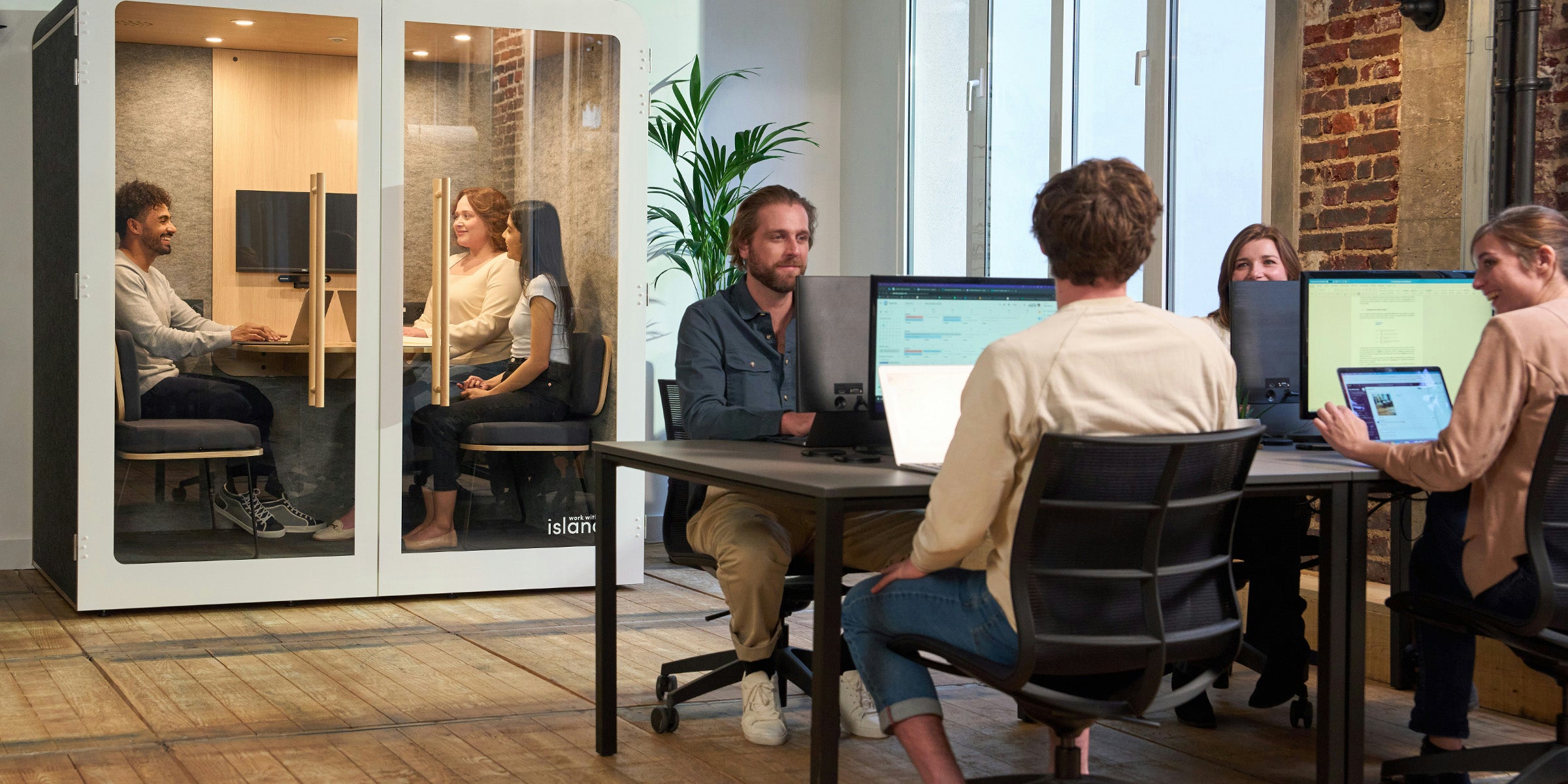 People working together in a modern collaborative workspace