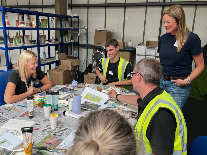 A team taking part in a structured creative workshop in the workplace